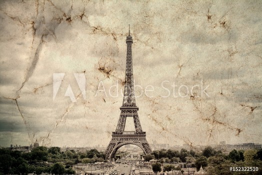 Bild på Eiffel Tower in Paris Vintage view background Tour Eiffel old retro style photo with cracks crumpled paper Postcard style 
